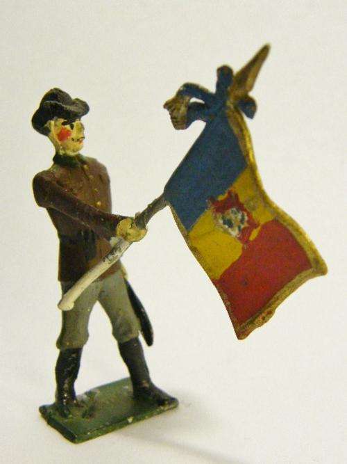 Vintage lead soldier with flag - as per photo