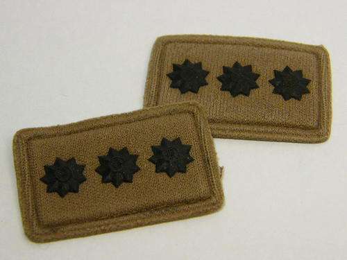 Pair of SANDF captain rank badges - as per photo