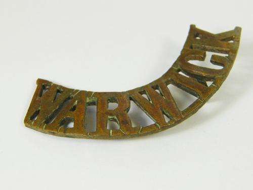 Warwickshire regiment shoulder title - one lug - as per photo