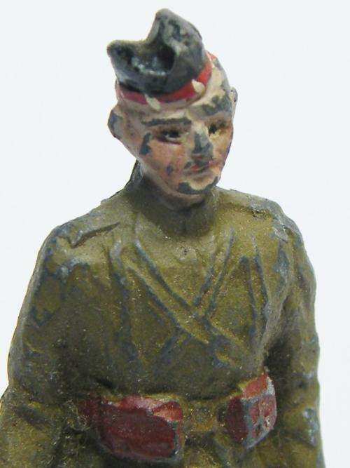 Vintage Scottish lead soldier standing with rifle - as per photo