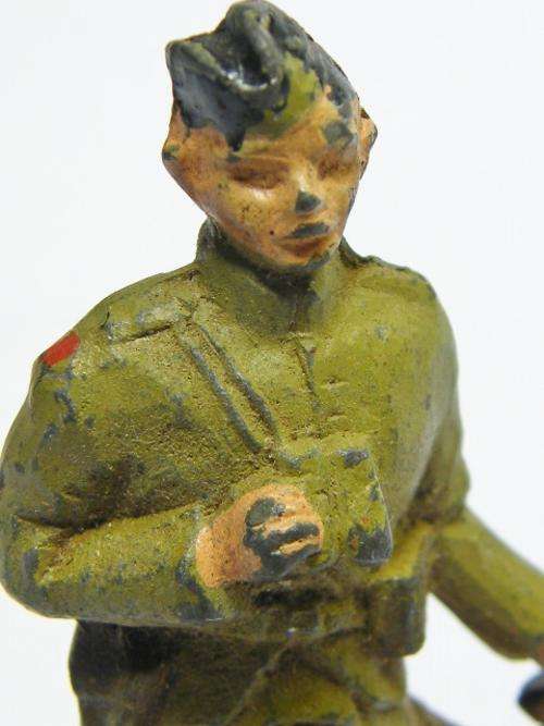 Vintage Scottish lead soldier with binoculars and sword - as per photo