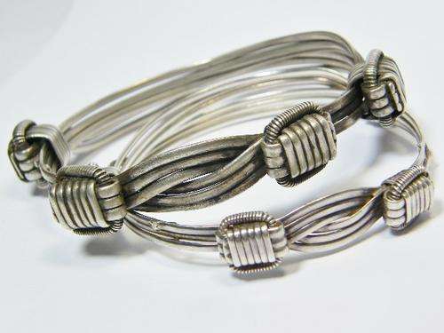 Patrick Mavros pair of sterling silver bangles (elephant hair type) - as per photo