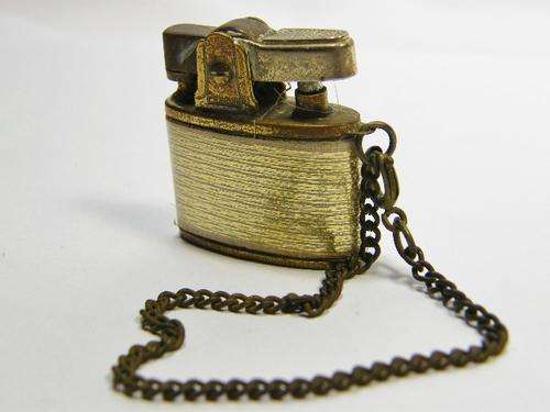 Vintage Penguin mini lighter with chain - needs flint - as per photo