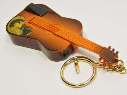 Vintage Guitar electric gas lighter with picture of Elvis - not working - as per photo
