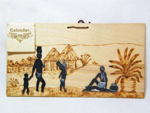 Vintage African wooden handmade plaque with small paper calendar of 1943 - as per photo
