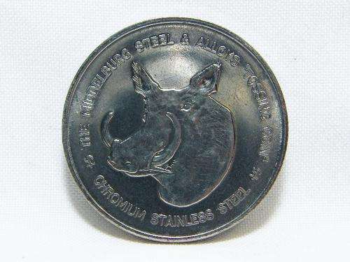 Middelburg Steel & Alloys tossing coin with warthogs - as per photo