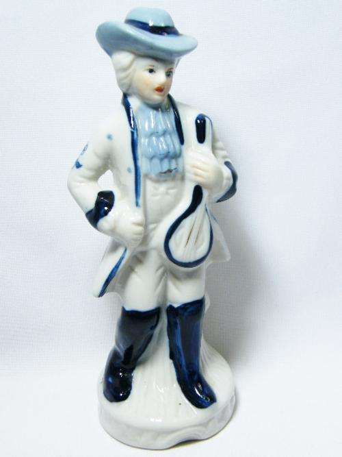 Vintage porcelain figurine of man with Ukulele - as per photo