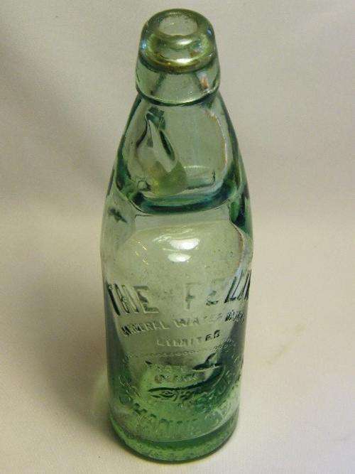 The Felix Johannesburg mineral water works glass bottle with marble - as per photo