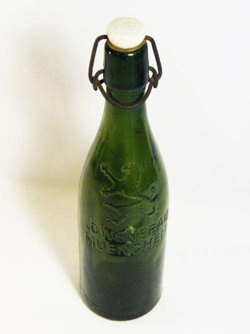 Vintage Lowenbrau Muenchen beer bottle with porcelain lid - as per photo