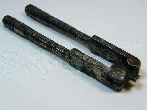 Antique metal nutcracker with banded handles - as per photo