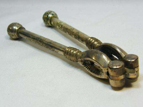 Vintage silverplated nutcracker with flower pattern handles - as per photo