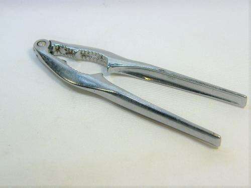 Vintage chrome plated nutcracker plier with double opening - as per photo