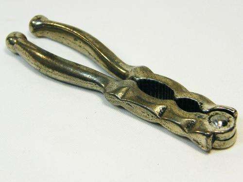 Vintage silverplated nutcracker with double opening - as per photo