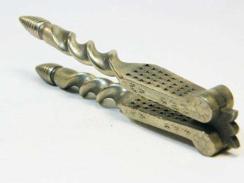 Antique white metal nutcracker with barley twisted handles - as per photo