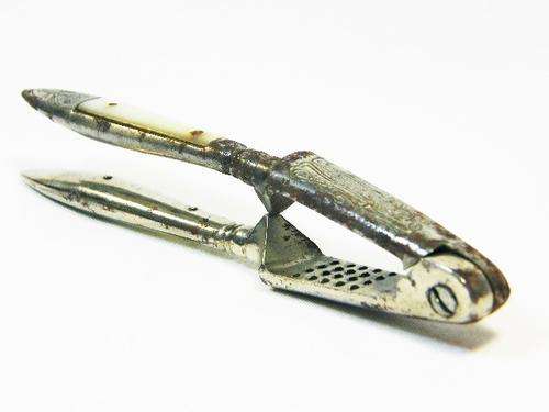 Antique silverplated nutcracker with mother of pearl handles - Geb Geschutzt - as per photo