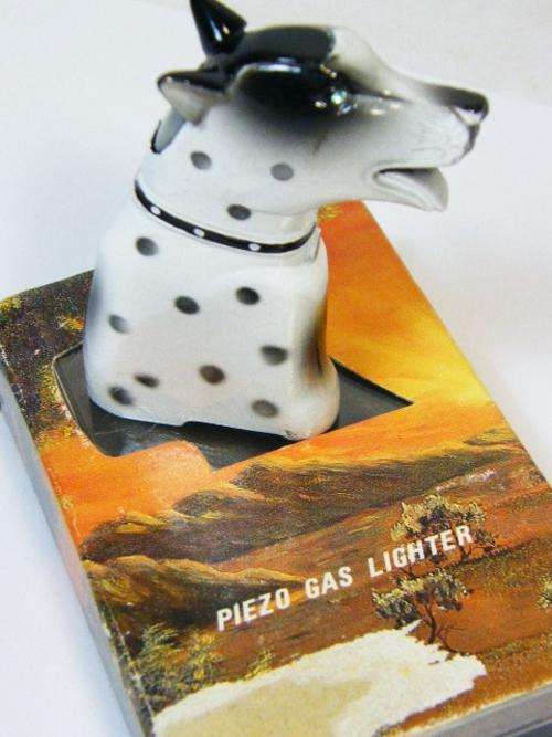 Piezo gas lighter in shape of Dalmatian dog - as per photo