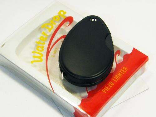 Water Drop 2 in 1 electrical lighter with measuring tape - working - as per photo