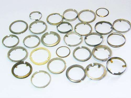 Lot of 26 vintage watch movement rings - as per photo