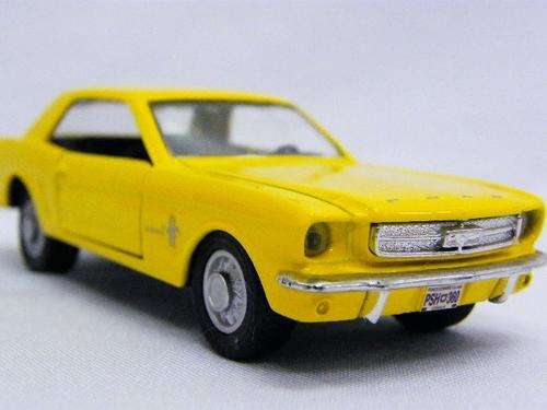1964 Ford Mustang model car - scale 1/39 Maisto with stand - as per photo
