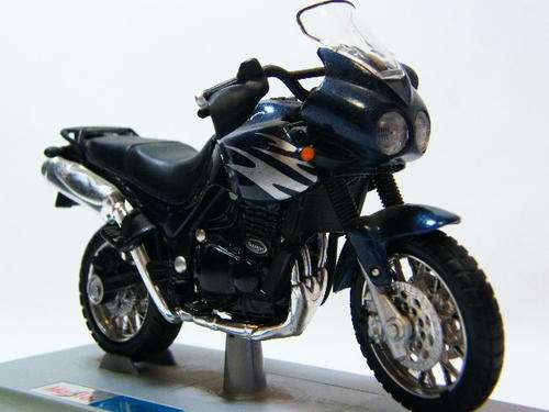 Maisto Triumph Tiger model motorcycle on stand - as per photo