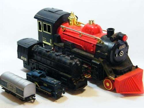 Lot of 4 toy trains - some pieces missing @ Crazy R1 start