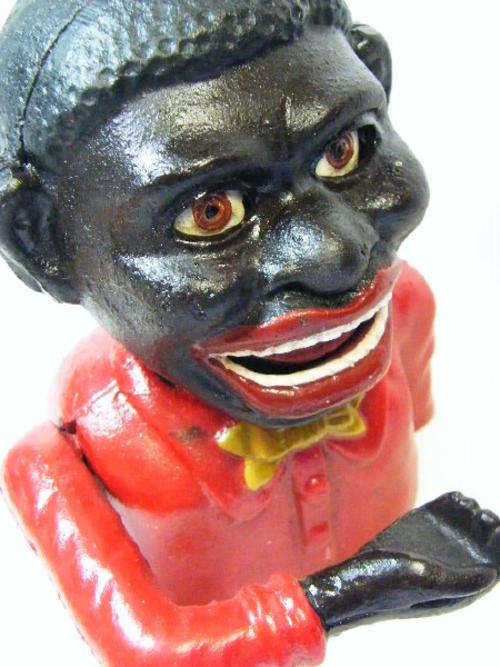 Antique Jolly Nigger Bank cast iron money box with moving hand - made by John Harper & Co. England