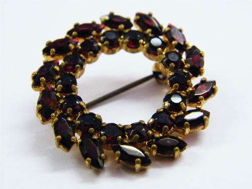 Vintage costume jewellery brooch with red stones - as per photo