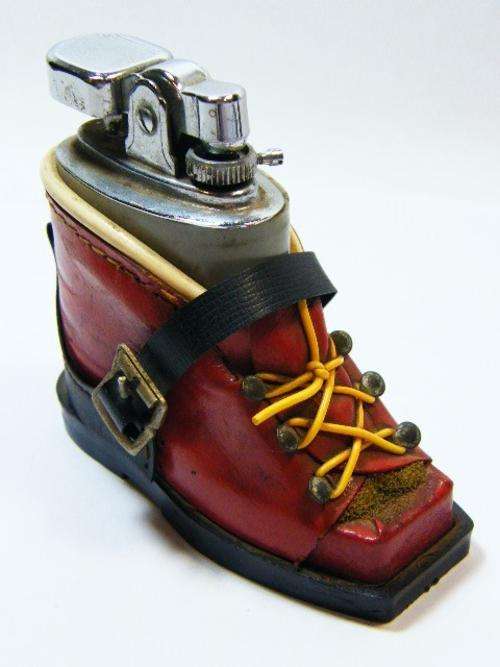 Vintage Penguin lighter in boot shaped stand - needs flint - as per photo