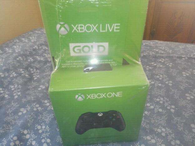 XBOX ONE SEALED WITH FREE GOLD SUBSCRIPTION AND FREE GAME 2 CONTROLLERS