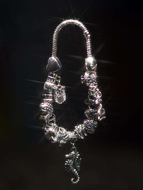Pandora silver plated, snake bracelet, 19mm length; with 15 charms