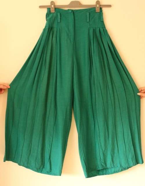 Green pleated palazzo pants