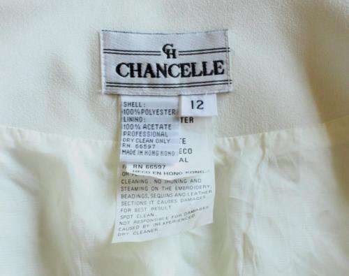Cream tunic with frill and lace detail (1980s)