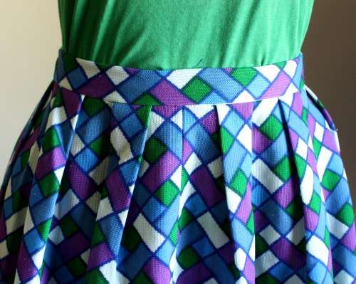 Bright 1960s full, fitted flared skirt