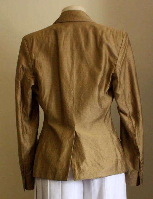 Gold silk jacket by Jenni Button