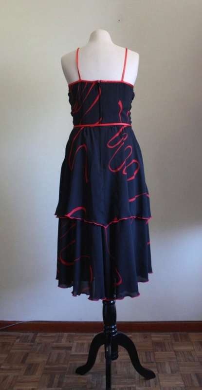 1970s black chiffon party dress with red contrasting detail