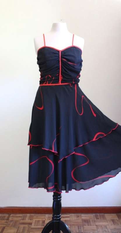 1970s black chiffon party dress with red contrasting detail