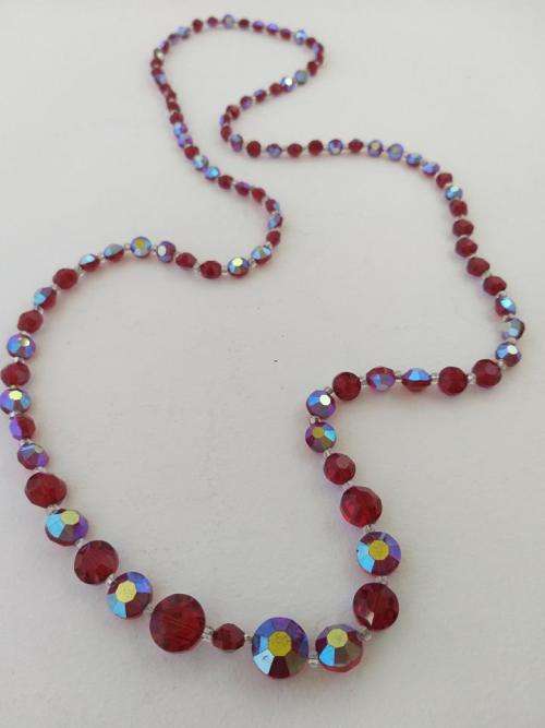 Long red Aurora Borealis bead necklace