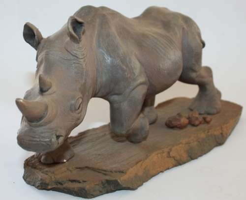 STUNNING BRASS RHINO ON STAND.  **FREE SHIPPING**  SEE DESCRIPTION