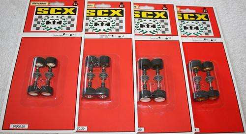 SCX VARIOUS NEW REAR WHEELS, TYRES & DIFF SETS. VAR MODELS SEE DESCRIPTION