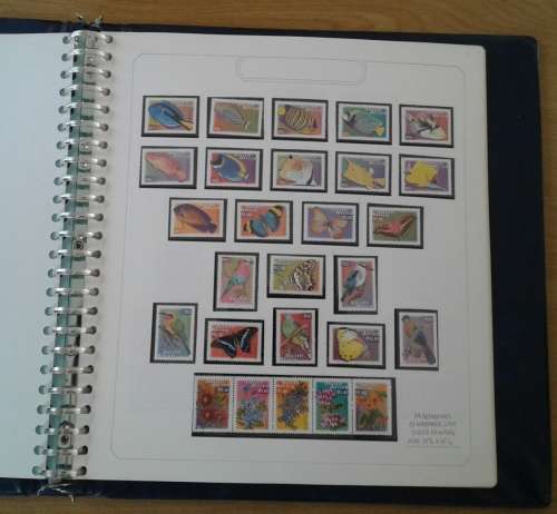 BEAUTIFULLY MOUNTED AND WRITTEN UP RSA COLLECTION. ALL UMM. NOT ALL PAGES SHOWN. HIGH CV.