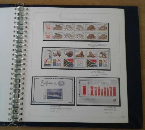 BEAUTIFULLY MOUNTED AND WRITTEN UP RSA COLLECTION. ALL UMM. NOT ALL PAGES SHOWN. HIGH CV.