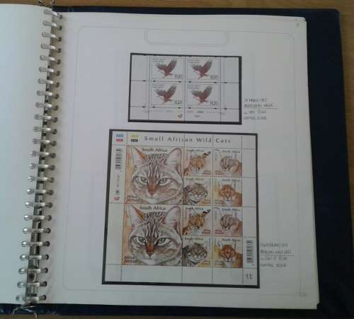 BEAUTIFULLY MOUNTED AND WRITTEN UP RSA COLLECTION. ALL UMM. NOT ALL PAGES SHOWN. HIGH CV.