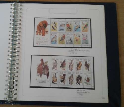 BEAUTIFULLY MOUNTED AND WRITTEN UP RSA COLLECTION. ALL UMM. NOT ALL PAGES SHOWN. HIGH CV.