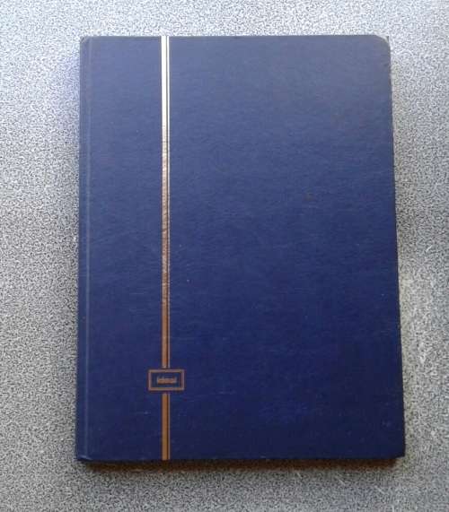 AS NEW VERY NEAT AND CLEAN IDEAL 8/16 STOCKBOOK. CLEAR STRIPS, DOUBLE INTERLEAVES.