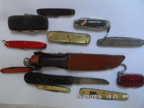TWELVE OLD KNIVES
