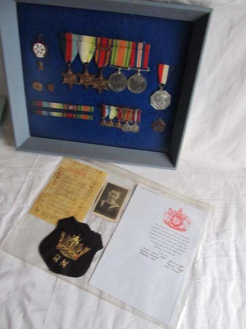 ENCASED MEDALS WITH DOCUMENTS