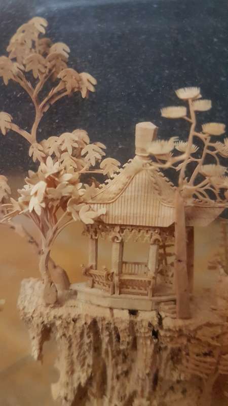 Vintage Japanses cork art featuring a diorama of a pagoda with two storks