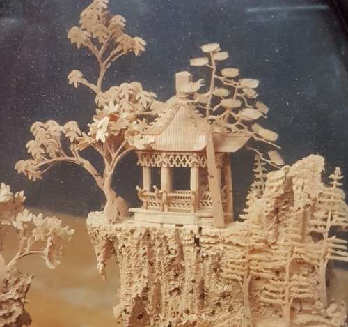 Vintage Japanses cork art featuring a diorama of a pagoda with two storks