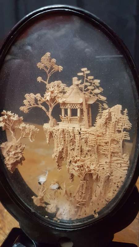 Vintage Japanses cork art featuring a diorama of a pagoda with two storks