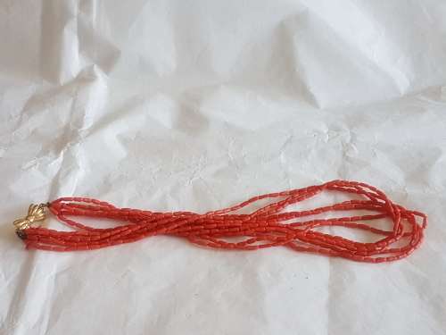 Vintage rice coral necklace with pretty bow shaped 18k gold clasp